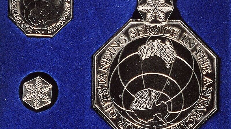 Australian Antarctic Medal sitting in a blue velvet box