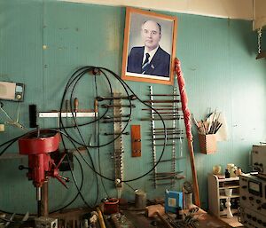 Green-walled room with portrait of former president of the Soviet Union Mikhail Gorbachev.