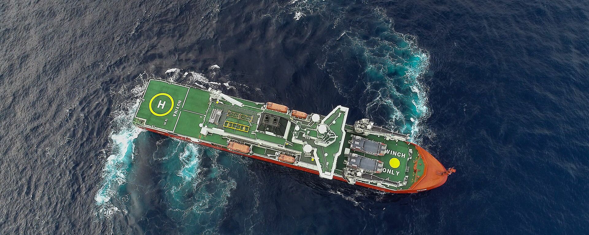 Aerial view of Nuyina with thrusters working.