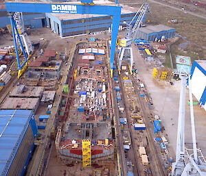 Lower level of Nuyina under construction in a dry dock.