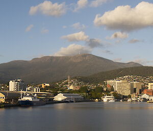 View of Hobart city and its mountain backdrop from the water.