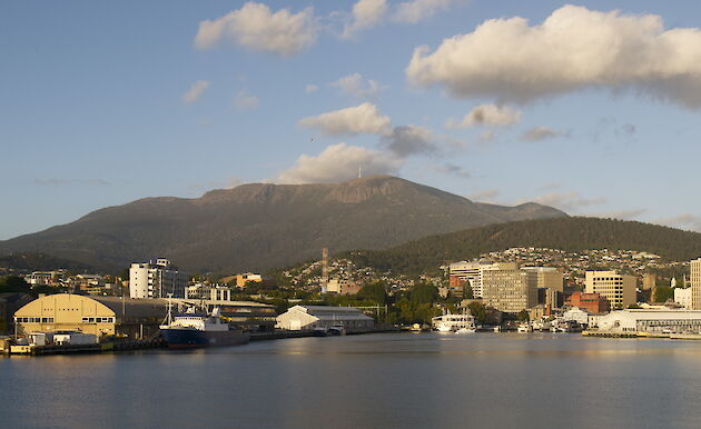 View of Hobart city and its mountain backdrop from the water.
