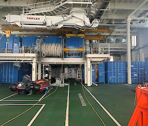 Blue shipping containers loaded in the Icebreaker's science deck