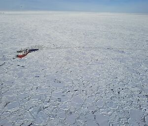 An aerial view taken from the helicopter of the MPV Everest in pack ice.