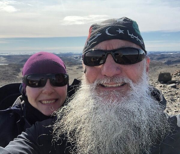 The author and his wife smiling for camera