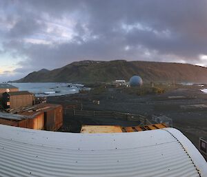 Looking over the station buildings to the sunset and dramatic grey clouds