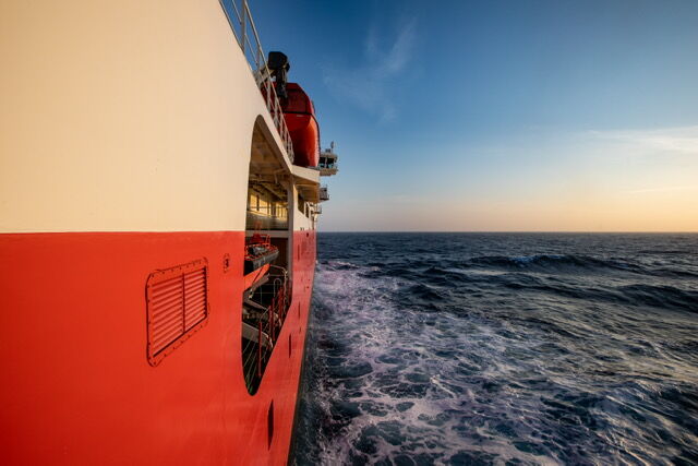 Looking up the side of ship towards the bow and horizon