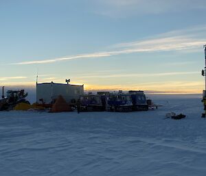 Dusk falls over the campsite with the Automatic Weather Station in the foreground