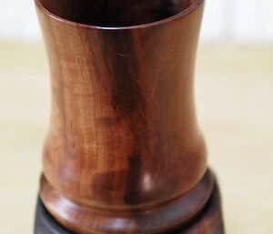 Dark brown hand made timber cup