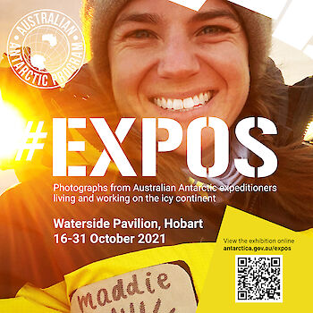 Self portrait of expeditioner Maddie Ovens wearing Antarctic clothing with sun shining over her shoulder. Text: #EXPOS exhibition of photographs from Antarctic expeditioners living and working on the icy continent. Waterside Pavilion, Hobart, 16-31 October 2021.
