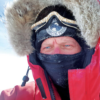 Expeditioner wearing beanie and balaclava