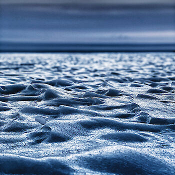 Close up view of patterns in the ice.