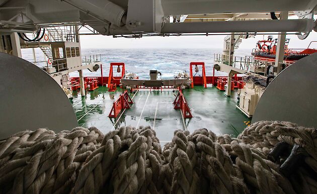 Trawl deck as viewed from the net drum and looking our over the ocean