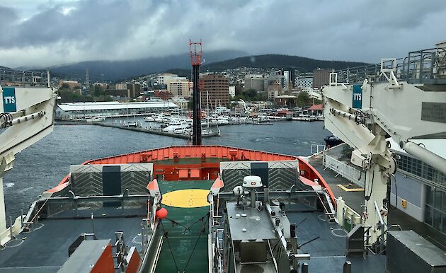 View over bow of Nuyina to Hobart city.