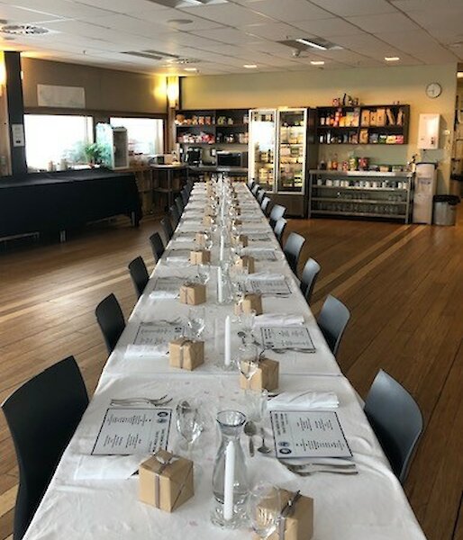 A long table set ready for a night of feasting