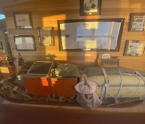 A fully loaded sled in the dog room under glass at Mawson