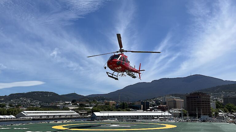 helicopter lands on ship deck