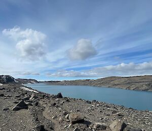 A large lake with rocky shores