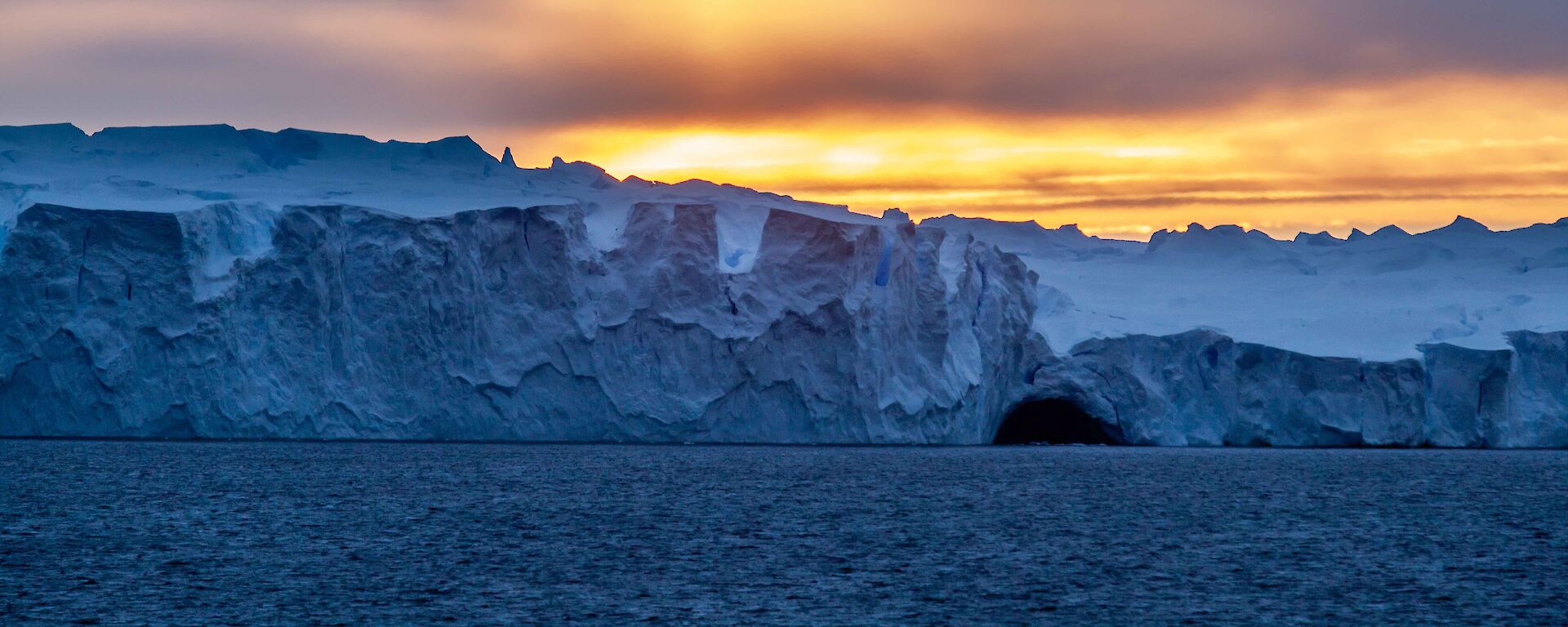 glacier front at sunset