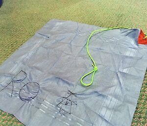 A handkerchief with a string attached to stop it blowing away in the field