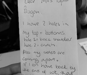 A hand written note requesting some repair work to clothes