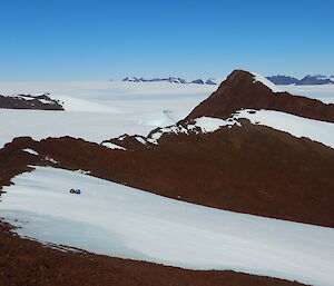 Henderson hut, a firm favourite, sitting near the ridge-line taken from Mt Henderson climb near Mawson