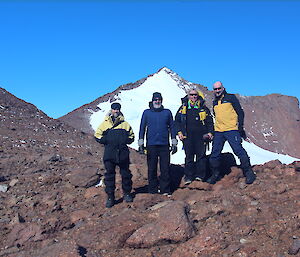 Expeditioners, Mark Baker, Mark Grainger, Kerryn Oates and Billy Merrick above Patterned Lake in the Central Masson range near Mawson