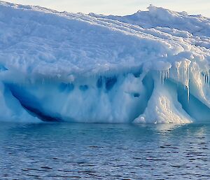 A frozen blue iceberg