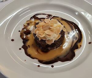 A plate of sticky date pudding