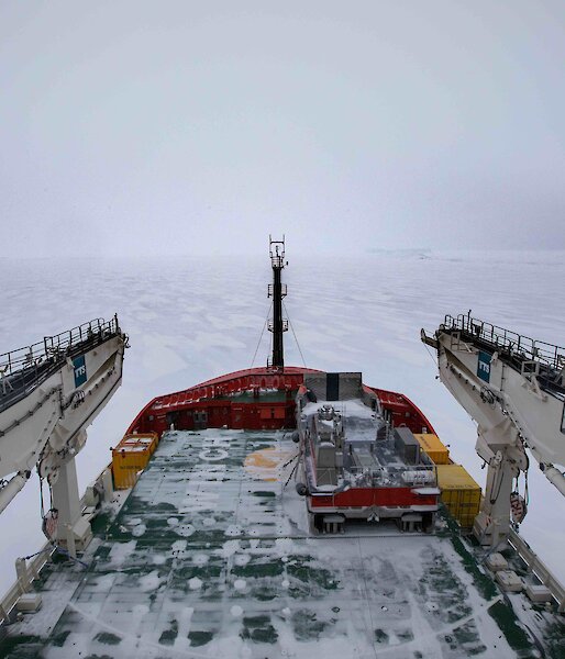 The front of a ship covered with snow