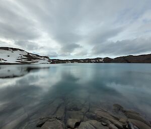 A lake showing clearly the rocks under the water