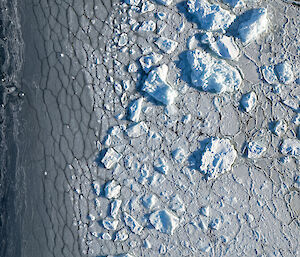 Looking down on the edge of sea ice forming and the different sizes and shapes of pancake ice