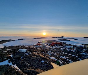 View from top of the wind turbine across Mawson station and the sea ice in the distance