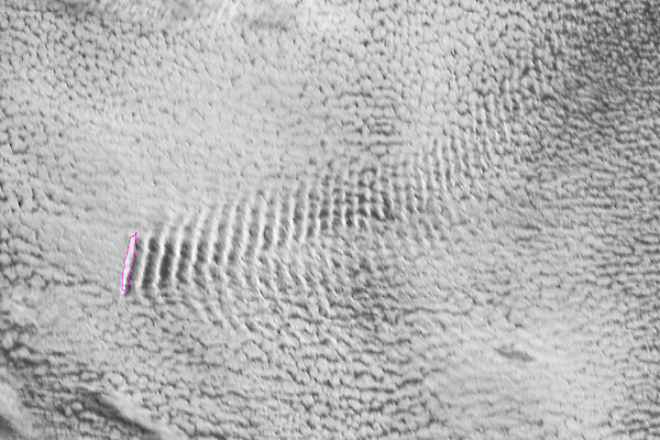 A Satellite image of a mountain cloud down wind