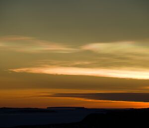 Sunset light and above the pearlescent PSCs