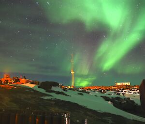 Aurora light over station seen from window of expeditioner's bedroom