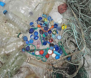 A pile of plastic bottles along found on the west coast of Macquarie Island