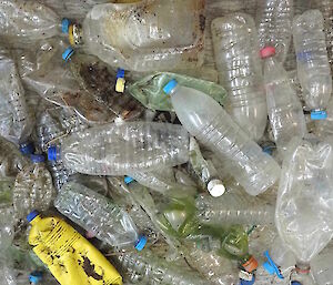 A pile of plastic bottles along found on the west coast of Macquarie Island