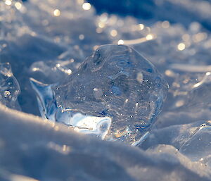 Chunk of clear ice shaped like the map of Antarctica