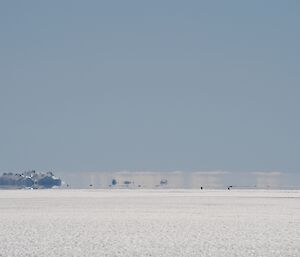 Showing the fata morgana mirage where icebergs a floating above the horizon