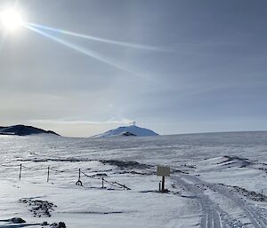 vista of snow covered mountain blue sky and sunny