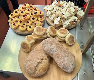 Three plates of bakery goods