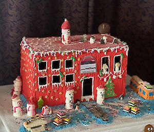 Large ginger bread house in shape of Mawson's living quarters building (the red shed)