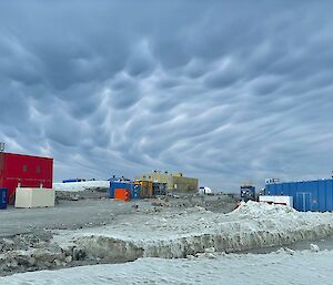Mammatus clouds over Casey station buildings