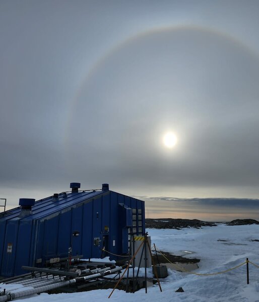 Cirrostratus cloud and halo over Casey's blue Balloon Shed
