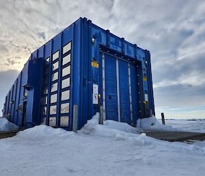 Casey's small blue balloon shed with stratocumulus and altocumulus cloud layers