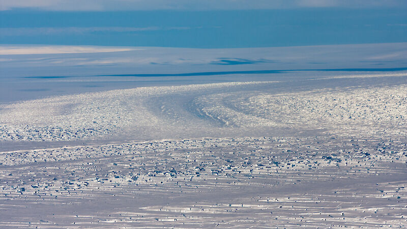 Icy river stretching to the horizon