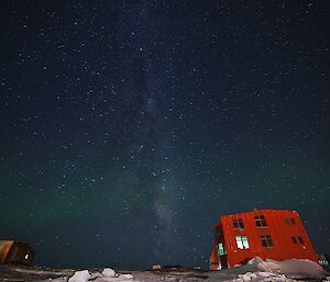 A night shot of the red shed showing many stars