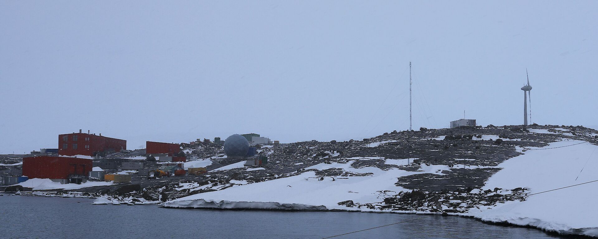 Snowy day with ice and snow around a station