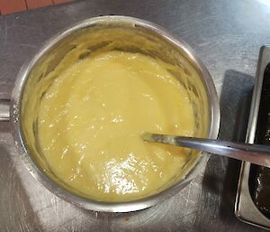 Custard served in a saucepan